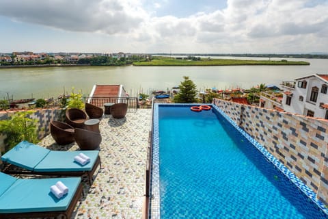 Property building, Communal lounge/ TV room, Day, Natural landscape, View (from property/room), Balcony/Terrace, Living room, Seating area, Lake view, Pool view, River view, Sea view, Swimming pool, sunbed