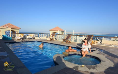 Day, On site, Pool view, Sea view, Swimming pool, older children, group of guests, sunbed