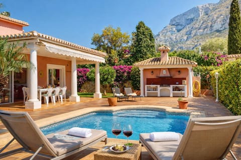Property building, Patio, Spring, Day, Natural landscape, Garden, Living room, Seating area, Dining area, Garden view, Mountain view, Pool view, Swimming pool, sunbed