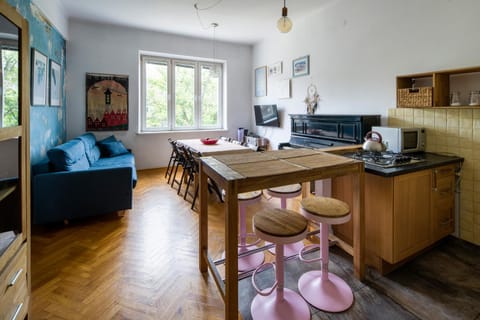 Living room, microwave, stove, kitchen