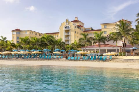 Property building, Nearby landmark, Day, Natural landscape, Beach, Pool view, Sea view, Swimming pool, sunbed