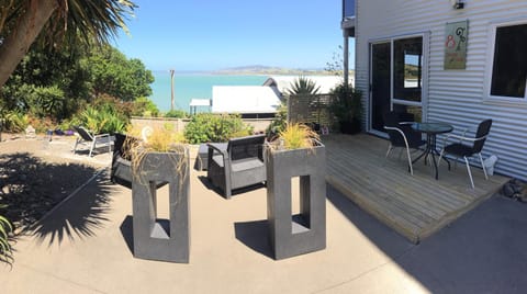 Property building, Patio, Day, Seating area, Dining area, Sea view