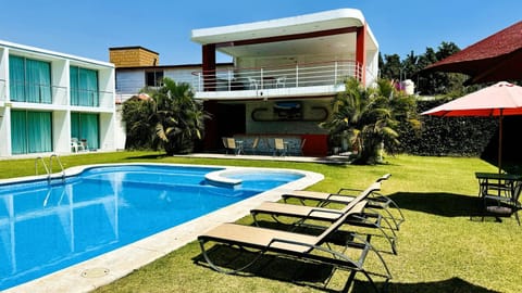 Property building, Patio, Spring, Garden, Garden view, Pool view, Swimming pool