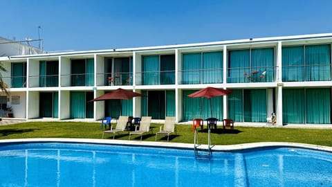 Property building, Patio, Day, Pool view, Swimming pool