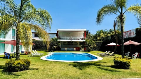 Property building, Natural landscape, Garden, Garden view, Pool view, Swimming pool