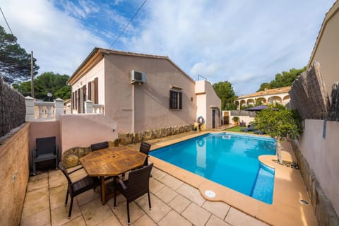 Property building, Living room, Swimming pool