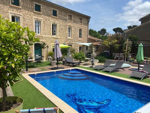 Property building, Patio, Patio, Swimming pool, Swimming pool