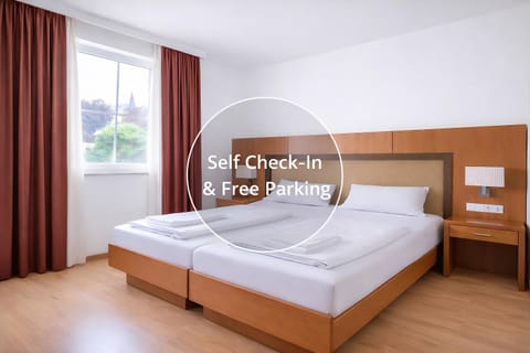 Bed, Day, View (from property/room), Photo of the whole room, Bedroom, Text overlay, towels