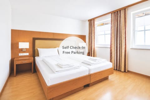 Bed, Property logo or sign, Summer, View (from property/room), Photo of the whole room, Text overlay, Text overlay