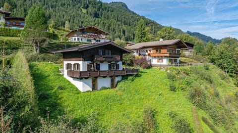 Property building, Nearby landmark, Day, Natural landscape, Mountain view