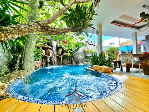Patio, Restaurant/places to eat, Day, Property logo or sign, Property logo or sign, Natural landscape, Activities, Activities, Garden, Hot Tub, View (from property/room), Decorative detail, On site, Garden view, Landmark view, Pool view, Area and facilities, Area and facilities, Swimming pool, Swimming pool, Time of day, Family, Inner courtyard view