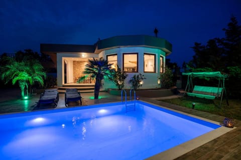 Property building, Night, Swimming pool