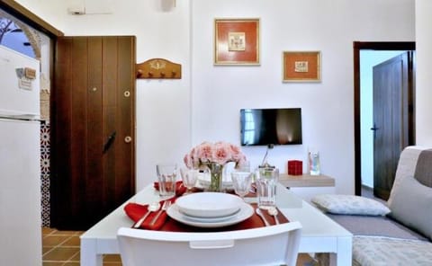 Property building, Staff, Communal lounge/ TV room, People, TV and multimedia, View (from property/room), Food and drinks, Other, Decorative detail, Dining area, Family