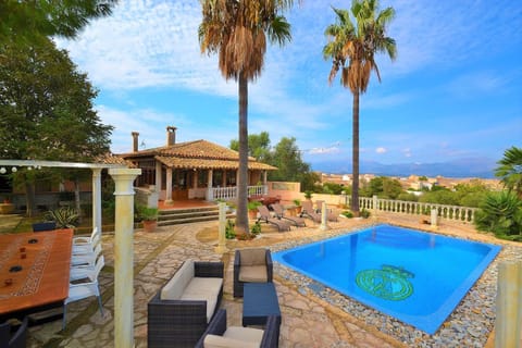 Property building, Patio, Day, Garden, View (from property/room), Balcony/Terrace, Pool view, Swimming pool, sunbed