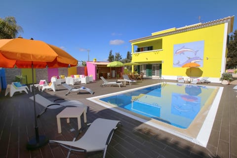 Property building, Patio, Day, Pool view, Swimming pool, sunbed