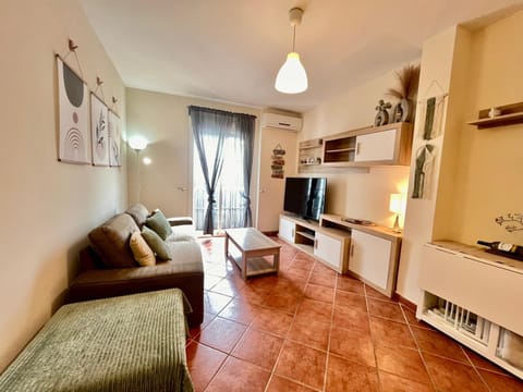 Communal lounge/ TV room, TV and multimedia, Living room, Photo of the whole room, Decorative detail, Decorative detail, Seating area, Family, Family, air conditioner