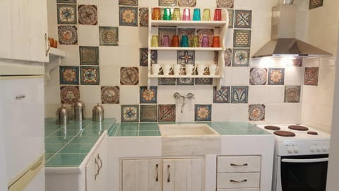 Kitchen or kitchenette, stove