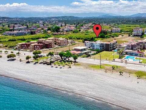 Property building, Natural landscape, Bird's eye view, Beach, Mountain view, Sea view, Location
