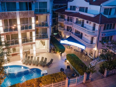 Property building, Patio, Night, Pool view
