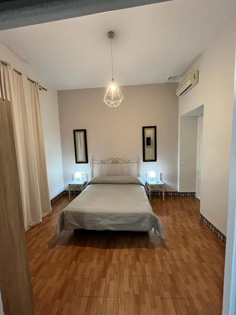 Photo of the whole room, Bedroom, air conditioner