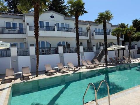 Property building, Facade/entrance, Pool view, Pool view, Swimming pool, Swimming pool