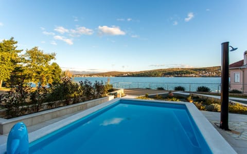Patio, Communal lounge/ TV room, BBQ facilities, Darts, Garden, Table tennis, Beach, Pool view, Sea view, Swimming pool