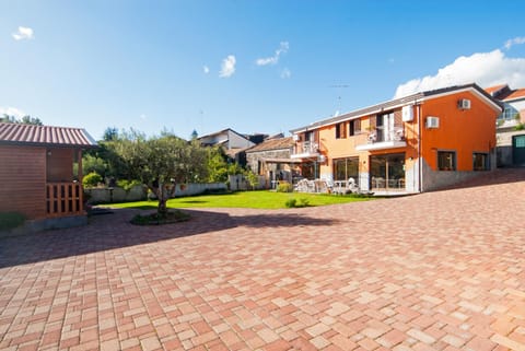 Facade/entrance, Garden view