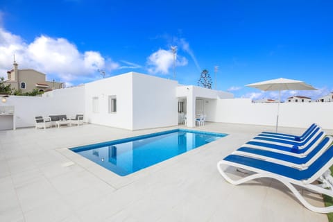 Property building, Living room, Swimming pool