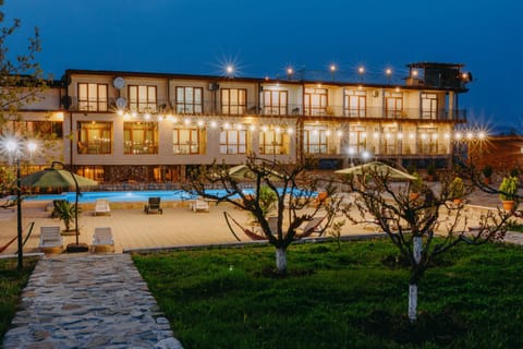 Property building, Night, Garden, Garden view, Pool view, Swimming pool