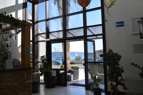 Facade/entrance, Lobby or reception, Sea view