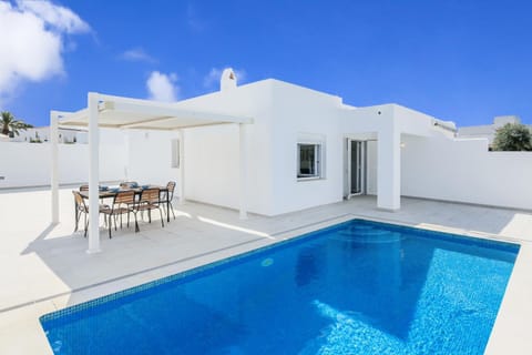 Property building, Living room, Swimming pool