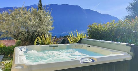 Magic Garden with Jacuzzi-Pool and Luxury Lake Como view Apartment in Lenno