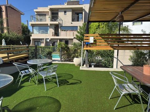 Property building, Patio, Spring, Day, Garden, View (from property/room), Balcony/Terrace, Garden view, Pool view, Swimming pool, sunbed