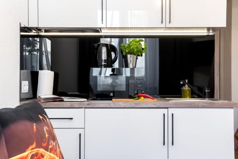 Kitchen or kitchenette, stove