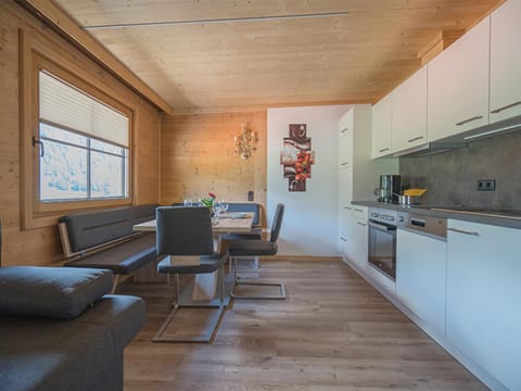 Kitchen or kitchenette, Living room, Seating area, Dining area