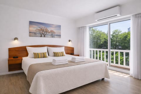 Bed, View (from property/room), Photo of the whole room, Bedroom, towels, air conditioner