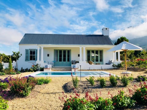 Property building, Patio, Garden, Swimming pool