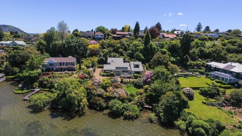 Property building, Bird's eye view, Garden, Text overlay, Garden view, Lake view