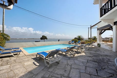 Property building, Living room, Swimming pool