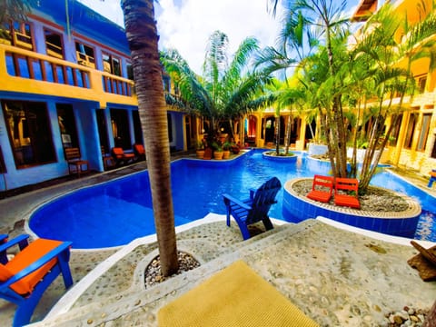 Property building, Pool view, Swimming pool, sunbed