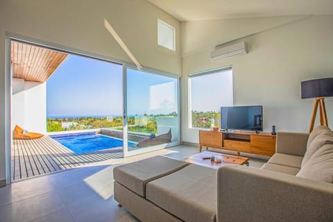 Natural landscape, TV and multimedia, Living room, Seating area, Pool view, Swimming pool, sunbed