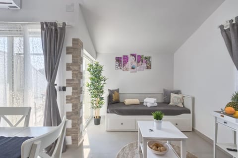 Bed, Living room, Seating area