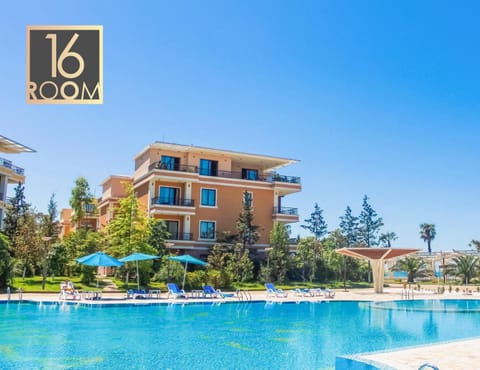 Property building, Property logo or sign, Pool view, Swimming pool