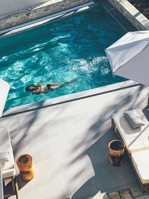 People, Natural landscape, Pool view, Swimming pool, sunbed