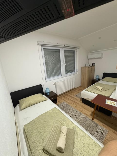 Bed, air conditioner