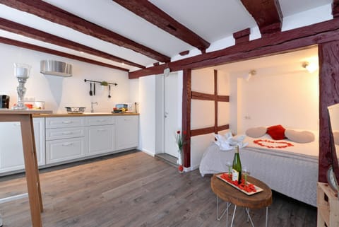 Photo of the whole room, stove