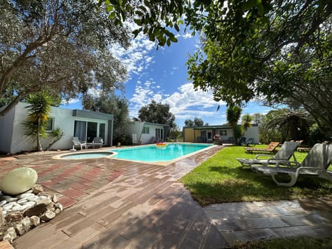 Property building, Day, Natural landscape, Garden, Garden view, Pool view, Swimming pool, sunbed