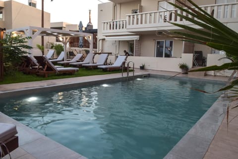 Property building, Patio, Day, Pool view, Swimming pool, sunbed