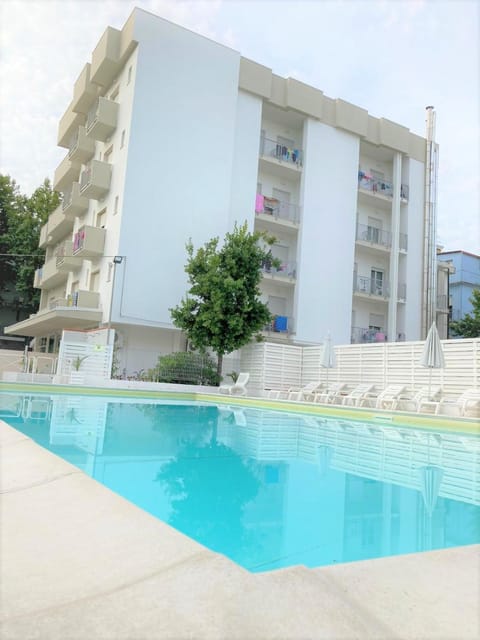 Property building, Pool view, Swimming pool, sunbed