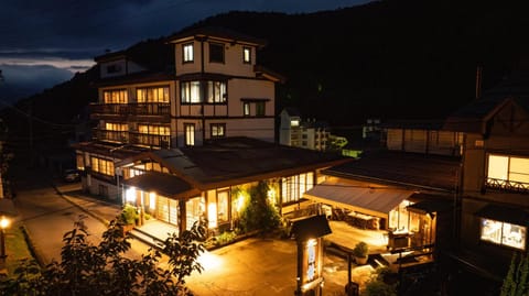 Property building, Restaurant/places to eat, Night, Natural landscape, Mountain view, Parking